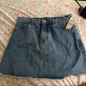 PCs in denim skirt